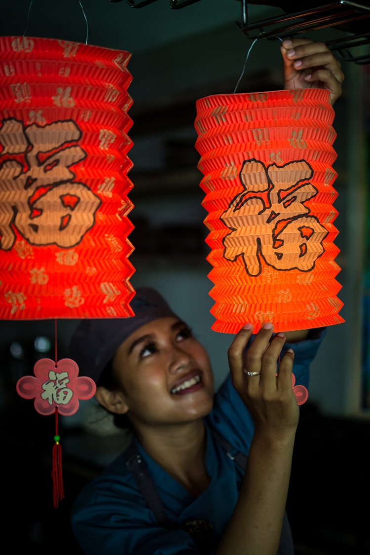 Chinese paper lanterns are hung by the chef at Blue Karma Oasis Escape in Seminyak, Bali